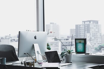 desktop monitor on desk in city office 