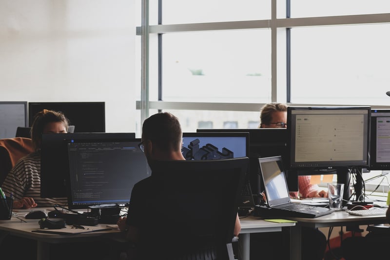 Man working at computer monitor
