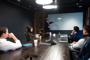 employees at meeting table